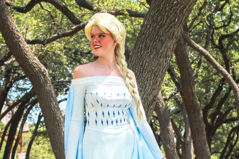 Wearing one of her three character outfits, junior Katie Smith poses in the Snow Queen costume. Smith first came up with the idea for a party princess business in March and quickly began the process of creating the character costumes and the budget. “My favorite thing about going to theme parks is interacting with the characters and having conversations with them,” Smith said. “I realized that that’s something I could bring to the kids right here in Cedar Park so I immediately started planning.”