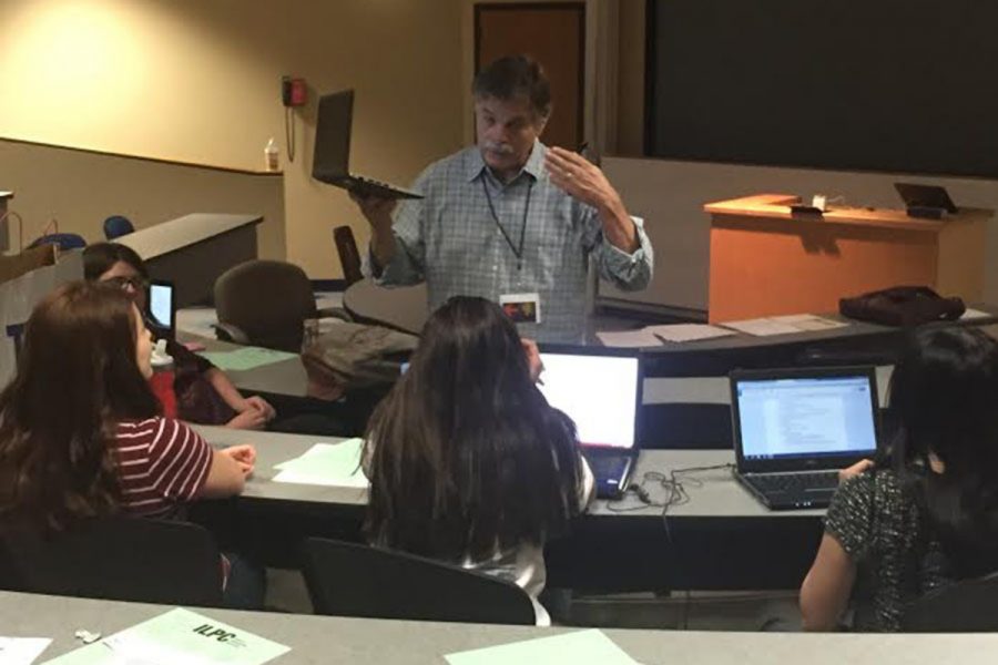Author Bobby Hawthorne teaching his Advanced Journalism class at the ILPC Camp on Jun. 26.