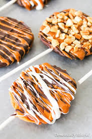Juicy apple slices submerged in caramel and glazed chocolate make for a perfect fall treat. 
