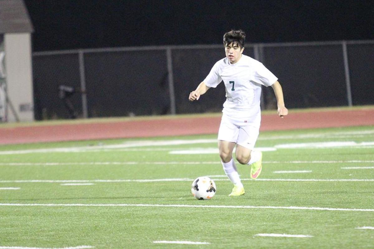 Captain and senior center back Brandon Castillo takes the ball down field on Feb. 3 against Connally High School. The Timberwolves fell short 0-3.