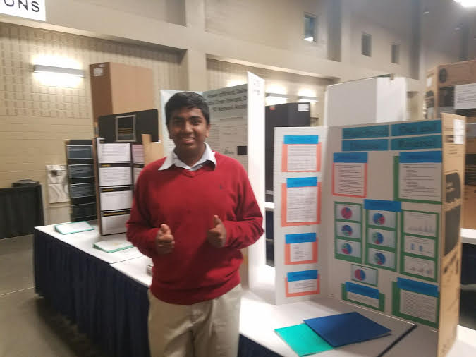 Junior+Shiva+Kumar+stands+in+front+of+his+board+for+the+Intel+Science+Fair.+%E2%80%9CWhat+I+am+trying+to+accomplish+is+for+the+future+and+for+the+future+doctors+to+be+able+to+utilize+this+plant+based+diet%2C+instead+of+taking+a+lot+of+medication%2C+when+people+are+having+these+metabolic+diseases%2C+Kumar+said.+