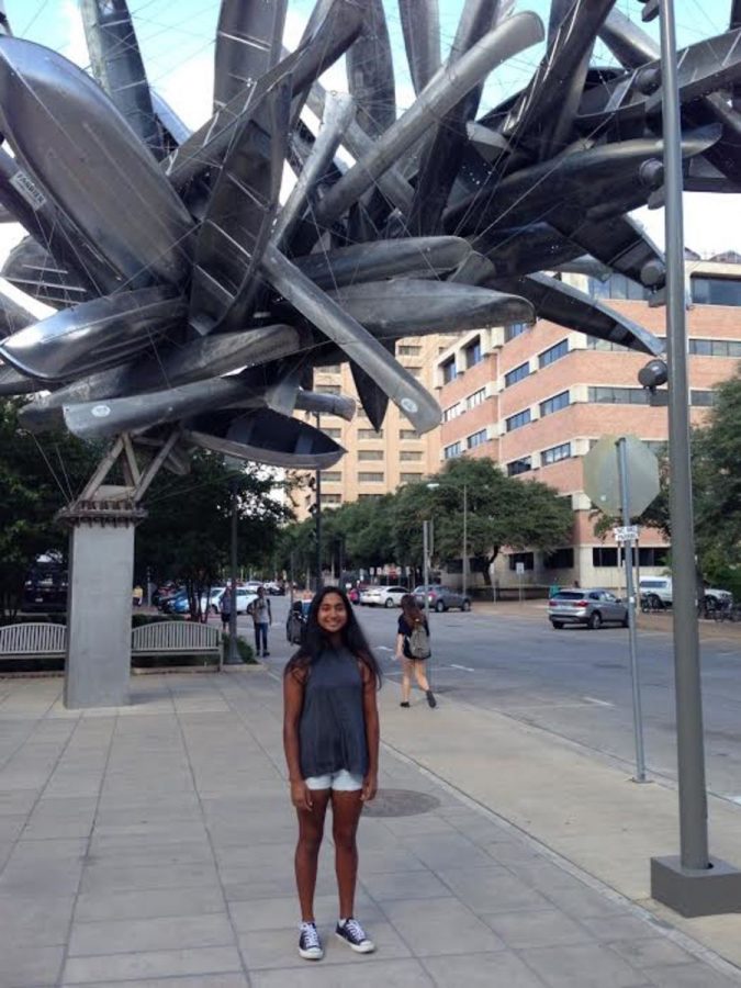 Senior Preethi Keerthipati stands in front of one of the many structures that don UTs campus.