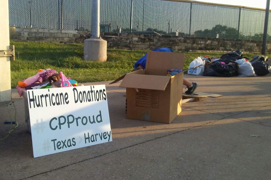 CP football boosters collect donation items for victims of Hurricane Harvey on Aug. 31 at the first Freshman home football game at Cedar Park HS.