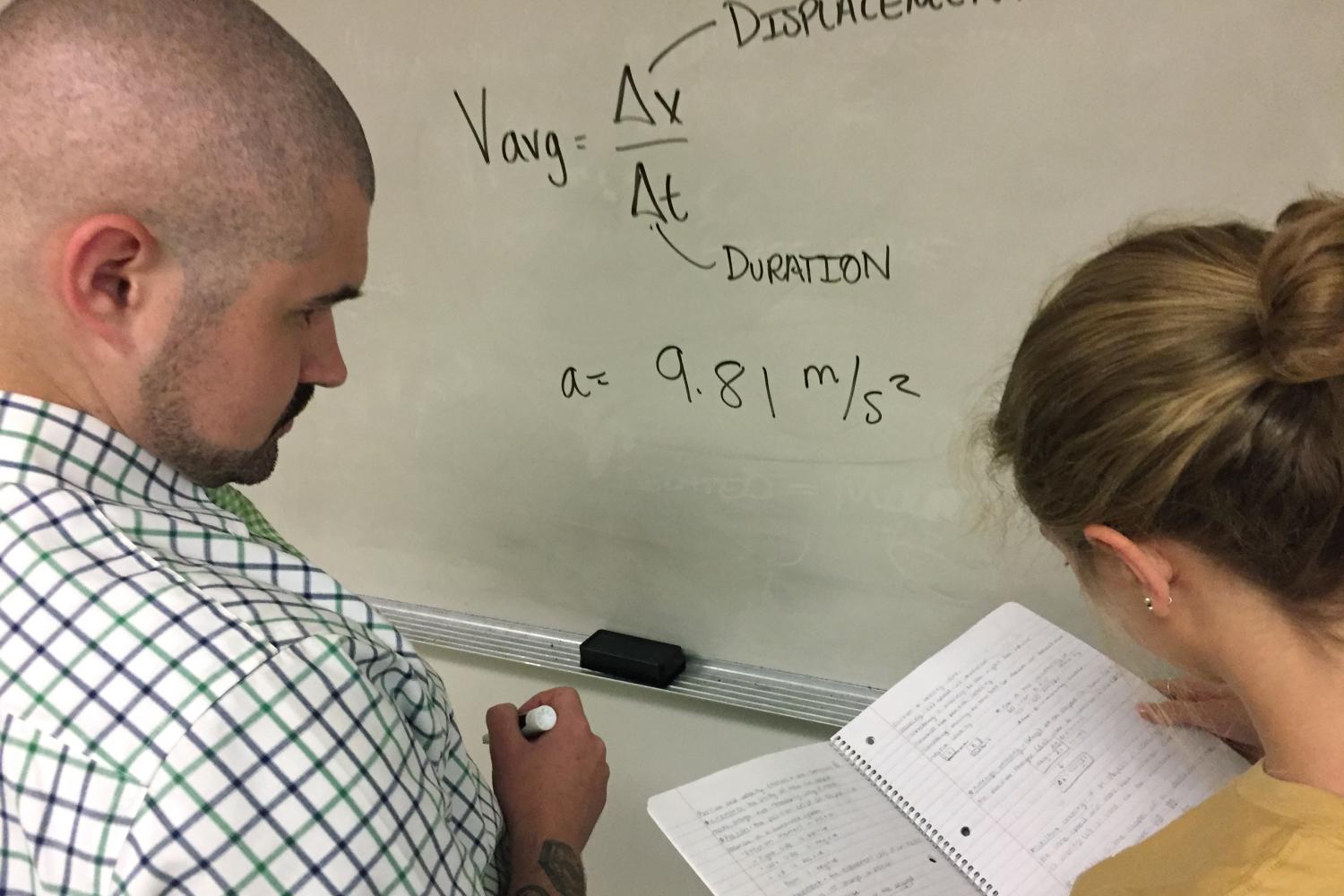 Stuck+on+a+physics+problem%2C+junior+Emma+Weddell+gets+help+from+Biology+teacher+Adam+Babich.+She+decides+to+go+to+him+over+anyone+else.%0A%22His+classroom+is+safe+and+has+a+happy+atmosphere%2C%22+Weddell+said.+%22He+has+helped+me+through+the+years+with+the+most+difficult+homework.%22