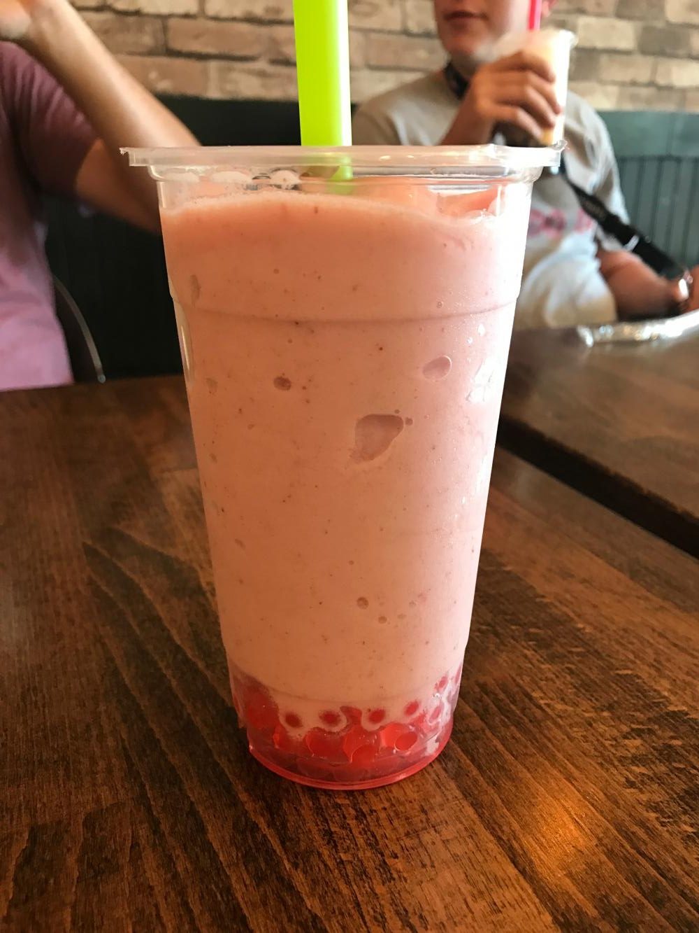 Reporter Gillian Corona snaps an artsy photo of her boba drink just before enjoying the colorful smoothie.
