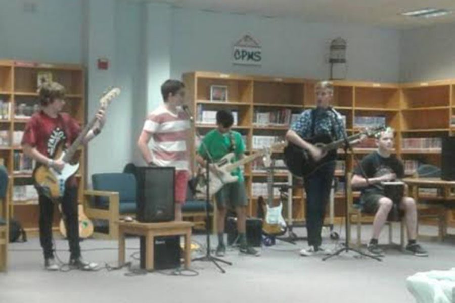 At one if their first concerts, freshmen Brody Bush (far left), Dylan Gilpin and Gustavo McClure perform at Cedar Park Middle School on June 1, 2017.