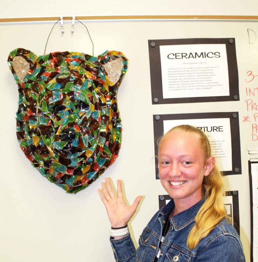 Mary Paige Perry presents her winning sculpture The Bear.