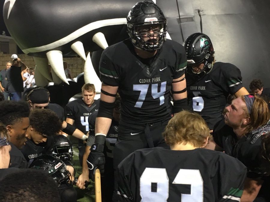 Senior Mason Brooks motivated his teammates before a football game against Hutto on November 3rd.
