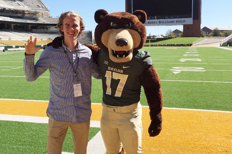 Hunter Howe stands next to the Baylor mascot, Lady, at his official visit to Baylor university. 