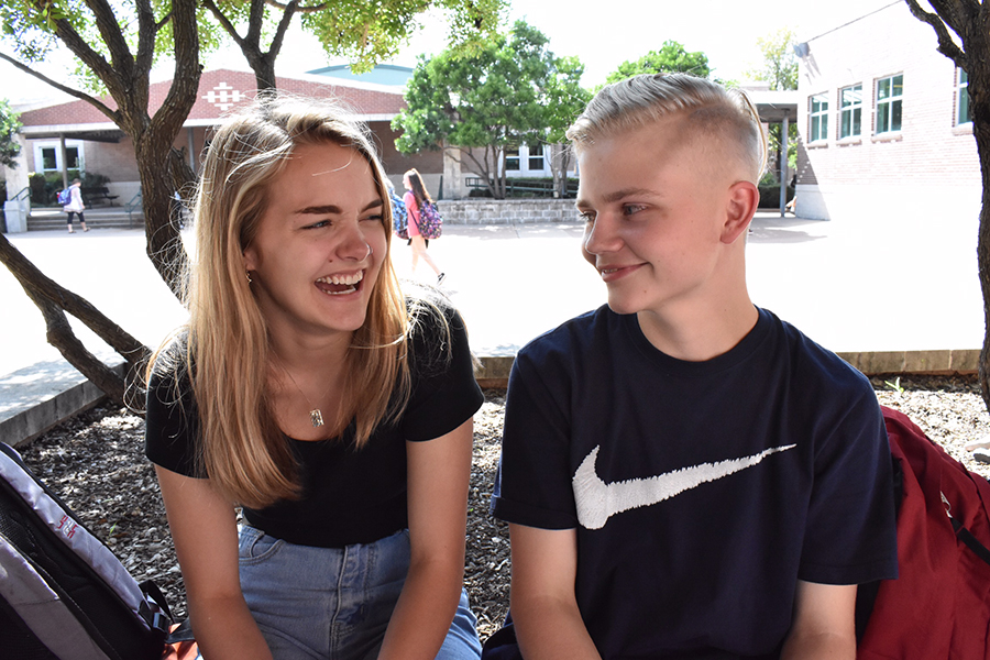 Sitting outside the science building, juniors Kat Kelley and Jonathan Mound hang out before first period. Kelley is a transfer student from Rouse High School and said she was surprised how easy it was to make friends when she got here. “I expected to not meet many people at first and keep to myself,