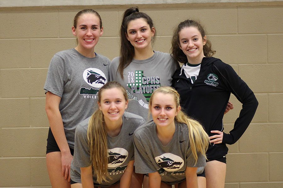 The voleyball seniors pose for a picture before a game against Eastview at Liberty Hill.