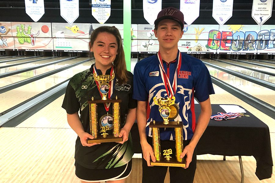 Junior+Addy+Bates+poses+with+her+trophy+after+being+named+Bowler+of+the+Year%2C+before+getting+second+during+the+state+bowling+competition.+My+freshman+and+sophomore+year+I+went+to+State+but+I+didnt+really+get+to+practice+as+much+outside+of+school%2C+Bates+said.+This+year%2C+I+was+ready+to+go+to+state.+There+would+be+sometimes+after+work%2C+Id+go+straight+to+the+bowling+alley+and+practice+until+11+p.m.+Everyday+when+I+had+the+opportunity%2C+or+even+sometimes+when+I+didnt+have+the+opportunity%2C+Id+be+up+there+practicing+because+hard+work+beats+talent+every+time.