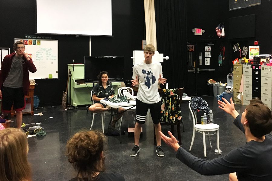 Troupe 6289s Thespian president, senior Carson Burke, speaks to fellow thespians before rehearsals. “I decided to run for president because I appreciated what the department had done for me,” Burke said. “I knew how much I loved everyone there, and I knew that I wanted to give something back to them. Organizing things seemed like the best way to do that.”