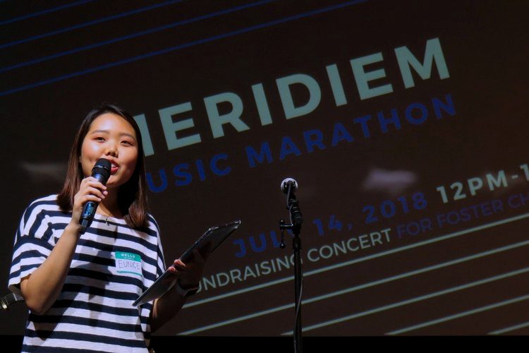 Alumna Eunice Lee stands on stage during the first Meridiem Music Marathon in 2018. This year, Meridiem was able to raise over $15,000 for Variety- Childrens Charity of Texas. “It was incredibly overwhelming to receive the news that our funds were going towards building a playground at Variety’s Peaceable Kingdom Retreat for Children,” Lee said. “I just wanted to do something that would further our society toward building a bridge between communities...and I wanted to do that through music. I think that we’ve accomplished [our mission] with our partnership with Variety and the Meridiem Instrument Petting Zoo.”
