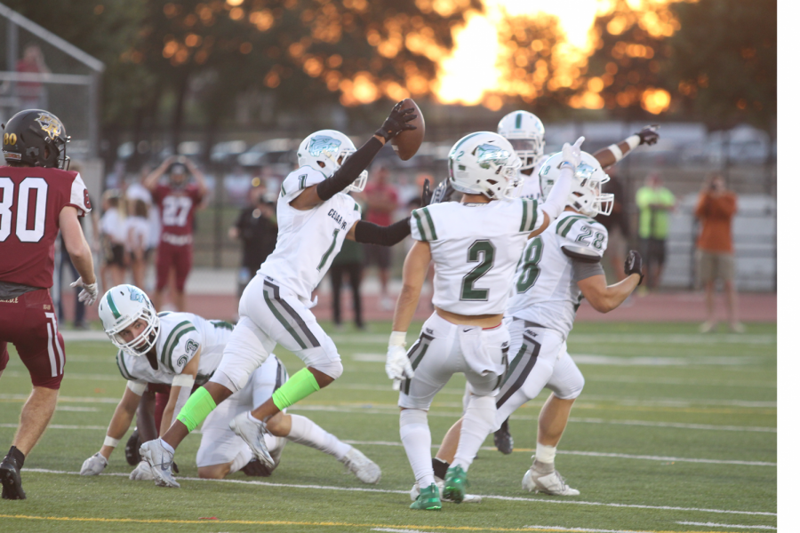 Senior+CB+Caden+Combs+celebrates+with+the+defense+after+picking+off+a+pass+on+Sept.+27+against+Rouse+at+Bible+Stadium.+The+defense+got+numerous+turnovers+against+Rouse%2C+thus+leading+to+short+fields+and+points+for+the+offense.+It+always+feels+great+when+your+team+is+clicking%2C+Combs+said.+Theres+no+better+feeling.