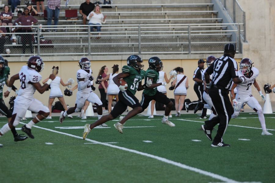 Junior WR Josh Cameron runs down the field against Katy Cinco Ranch. As district play begins this Friday, the team will need Gupton rocking every week as the team looks to win out and clinch a playoff berth.
The atmosphere was great and we were clicking on all cylinders and couldnt be stopped, Cameron said.