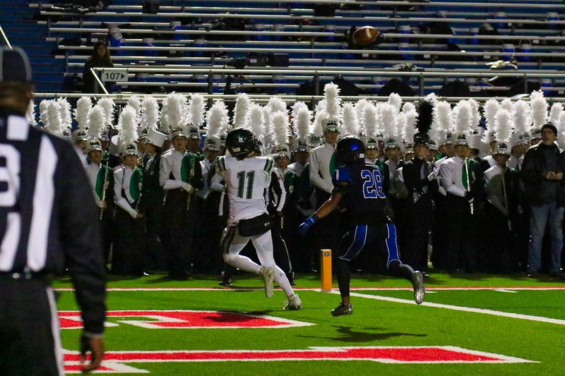 Finding the ball, junior WR Preston Scott prepares to catch the ball to put 6 points on the board. Scott and the timberwolves fought hard to beat Georgetown 38-15. "We try and catch as many footballs as we can during practice and try to improve as much as we can during the week," Scott said.