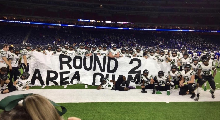 The Timberwolves hold up the Area Champs banner after defeating Friendswood, 31-14. Next up for Cedar Park is a regional matchup with Manor. The goal is to keep playing with an edge and keep our hunger to get better, senior DE Ben Bell said. [Were] not satisfied with the success weve had so far.