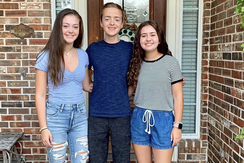 Sophomore Natalie Cohen stands with her twins, Jacob and Olivia Cohen. While growing up a triplet could seem intimidating, Cohen said that she really likes being a triplet.
“Being a triplet gives me a built-in interesting fact about myself,” Cohenn said. “I always have at least one sibling around, and it’s nice having two siblings around, especially since it’s one boy and one girl. It’s super fun when we occasionally get put in a class all together at school because it can be interesting and entertaining when we’re all together.”
