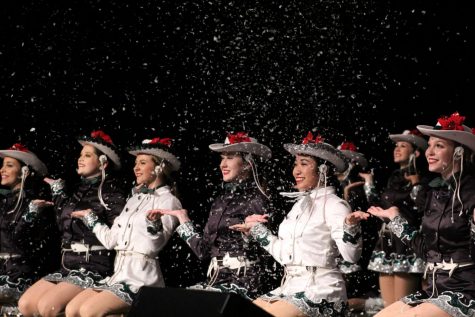 Smiling ear to ear, the celebrities finish out their holiday show with the grand finale. The show was sponsored by the celebrities, but the Spanish Honor Society, PALS, theatre, choir, both the CPMS and CPHS dance classes and the CPMS Crimson Cadets participated.