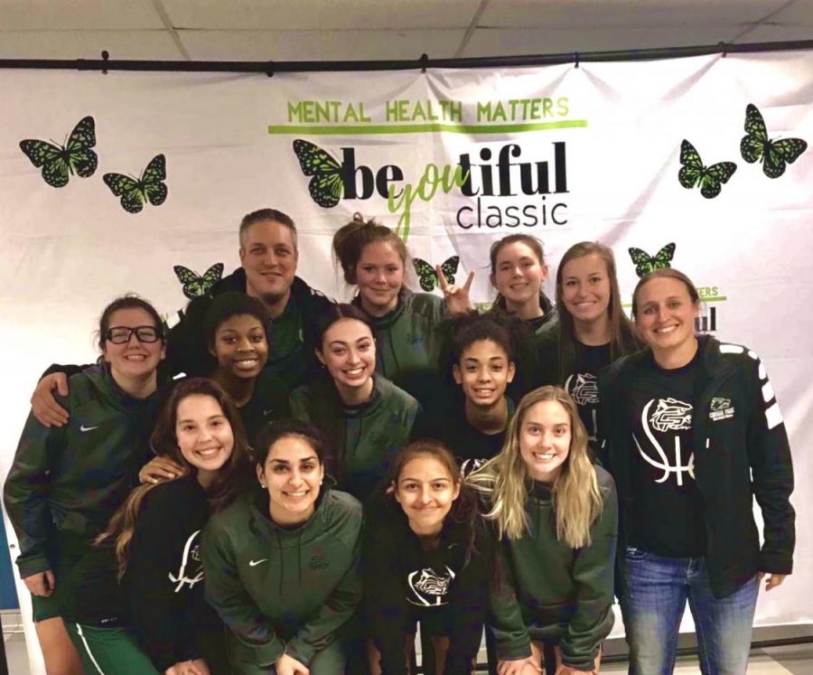 The Lady Wolves Varsity basketball team poses for a picture at the Austin Bowie Be-YOU-Tiful Tournament. The team plans to continue their success at the McDonalds Invitational Tournament this weekend. Were ready to compete against ranked 6A teams and get better for the bigger picture which is winning state, senior player Donya Yazdi said. 