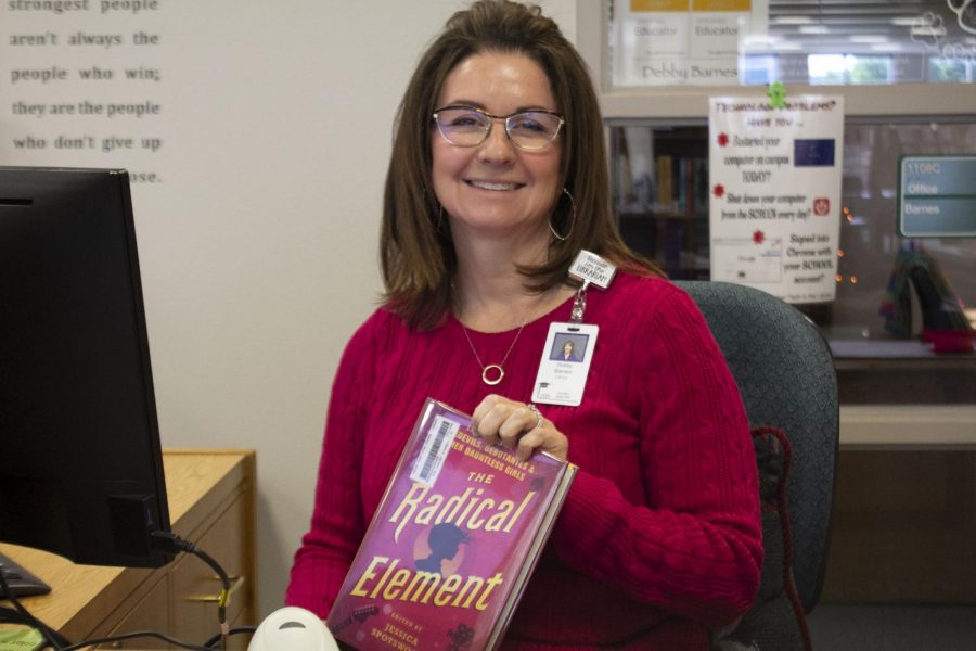 CPHS Librarian, Debby Barnes poses with a copy of Radical Element. Barnes got selected to be a member of the TAYSHAS Reading Program. “I think its great and I think it is an honor to get selected,” Barnes said. “I’m kind of feeling overwhelmed that I have too read over a hundred books in a year, but I am proud of being selected.”