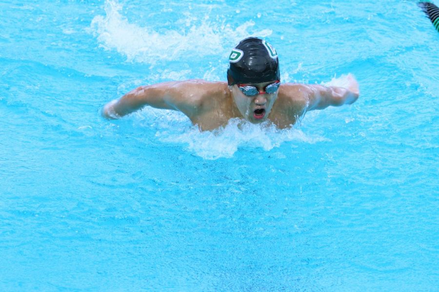 Swimming the 100 meter butterfly race, sophomore Thomas Wu comes up for air at the Rouse Dual meet on Oct. 2. The Cedar Park team ended up beating Rouse. I think weve had a really great season, Wu said. A lot of our swimmers had a really good time so its [been] pretty good.