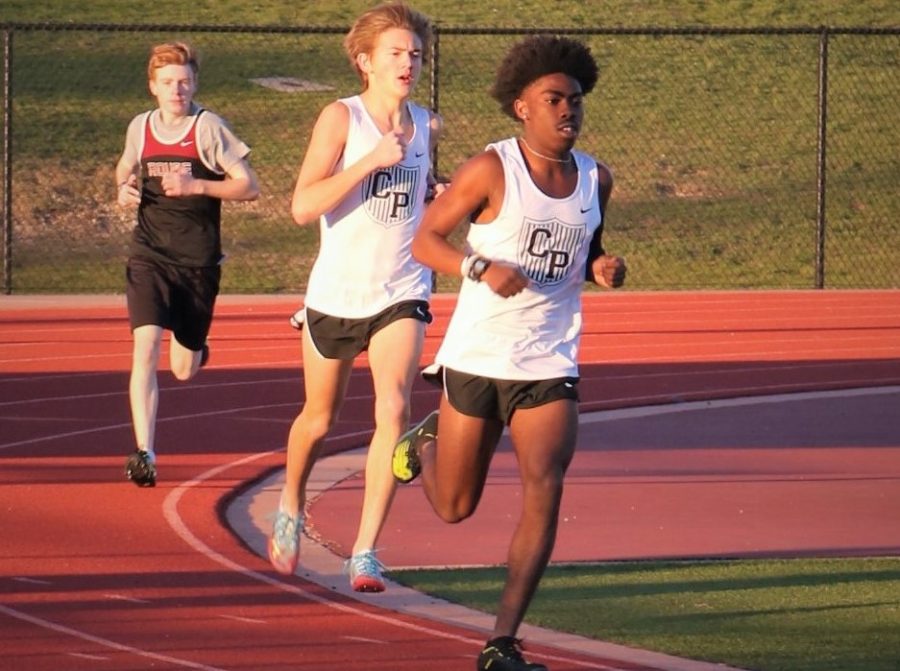 Senior Tiras Parker-Pie runs the two mile race in the teams first track meet of the season on Feb. 6. The team got first place in the meet against Rouse. This was one of the few races I was able to participate in before quarantine, but I still gave it my all, Parker-Pie said. I will be committing soon to run in college which I am very excited about and hope to take this sport as far as I can.
