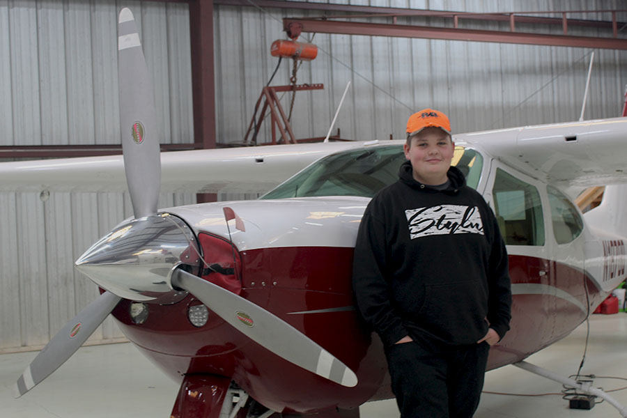 Standing in front of his Cardinal Airplane, Freshman Alex Trebilco reminisces about the good times hes had in it. I really like the Cardinal, Trebilco said. Its really fast, it flies well, and shes always treated us good. 
