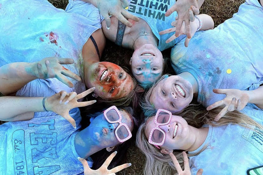 Beaming with delight, members of YoungLife flaunt their color-stained faces after participating in the Color War, held on Aug. 30. This color war is one of the many events that YoungLife holds in order to encourage everyone to come to their gatherings. “They want to gather high schoolers from Vista Ridge and Cedar Park, no matter what they believe in, to come together as a community,” freshman Emery Taylor said. “[They want us to] have just like an hour or two to hang out and just talk about what matters to them.”