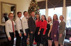 Standing together, all nine members of the Wilkinson family pose for a picture. Among the quintuplets include Kassidy, Kaydence, Rustin, Kyndall and Ryder, who all started their first year of high school this '21-'22 school year. “When I’m laying in bed at night before I fall asleep, after my prayers, I just think ‘wow, I like being a quintuplet,'" Kassidy said. 
