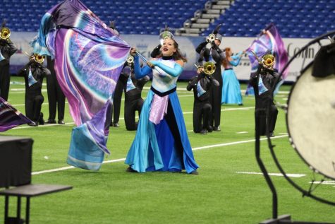 The color guard wins UIL 5A State Champions with band while performing with the theme “Eye See,” which includes vibrant and colorful shades of blue and purple for costumes. The color guard will perform their new show tomorrow with the theme electricity. “I think performances are really valuable to the program,” sophomore Lily Dodds said. “We get to show off and people get to see what we’re capable of.” 