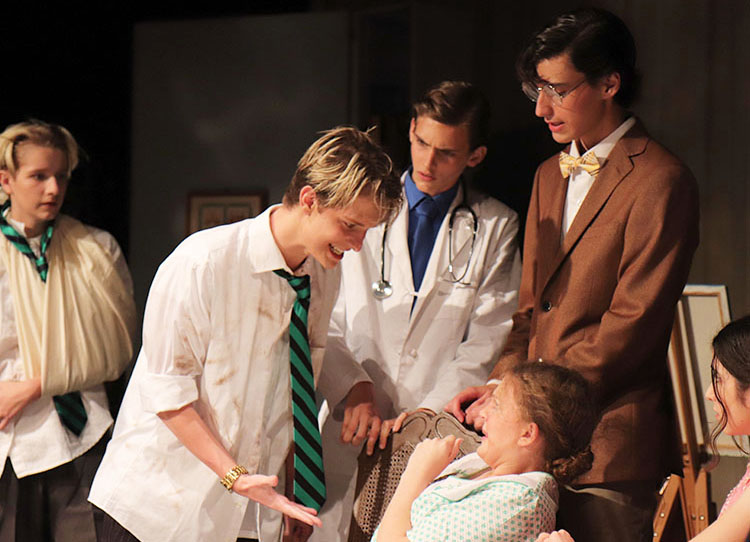 Yelling at a patient, freshman Zane Rasmussen embraces his role as a doctor. Unlike other productions, the theater department performed the play Curious Savage in the blackbox, or theater classroom, instead of the PAC. This show was very enjoyable for me because there was such a small cast so that by the end it felt like everyone knew everyone else to some degree,” Rasmussen said. “It just made the relationships I have with these people much stronger than if it were a larger production with a huge cast. My favorite part of this show was when we were all practicing, and to get into character, we would sometimes do improv scenarios involving all of the cast. For example, the savages returning to the cloisters as patients after the events of the show.