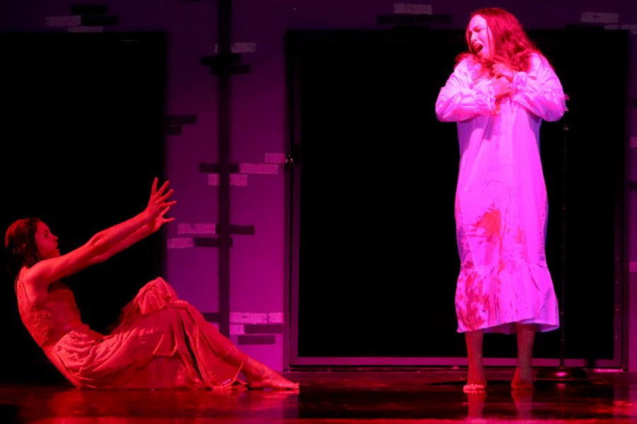 Falling to the ground, Carrie, played by senior Lucy Walter, kills Margaret White, Carries mother, played by senior Annika Johnson. The theatre department’s fall production of “Carrie was the first large scale musical put on at the school since 2020. Ive never played such an intense role before and it was definitely a challenge to feel comfortable during the scenes the show requires, but thanks to the cast and everyone involved I never once felt uncomfortable performing, Walter said. 