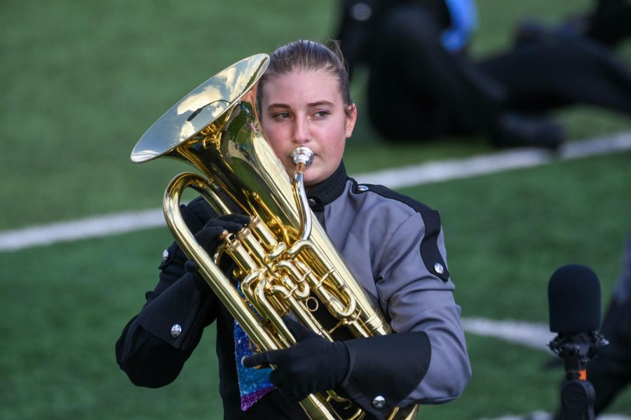 Playing+the+euphonium%2C+sophomore+Adalia+Stiglich+marches+in+the+5A+UIL+Area+marching+competition+on+Oct.+23.+Stiglich%2C+who+has+been+playing+the+euphonium+since+middle+school%2C+also+plays+the+harp+and+piano.+%E2%80%9CI+think+I%E2%80%99m+putting+harp+aside+for+the+next+two+years+to+do+something+with+euphonium%2C%E2%80%9D+Stiglich+said.+%E2%80%9CI+would+like+to+try+to+make+State+with+euphonium%2C+but+thats+a+lot+harder+than+harp%2C+so+we%E2%80%99ll+see+what+happens.%E2%80%9D