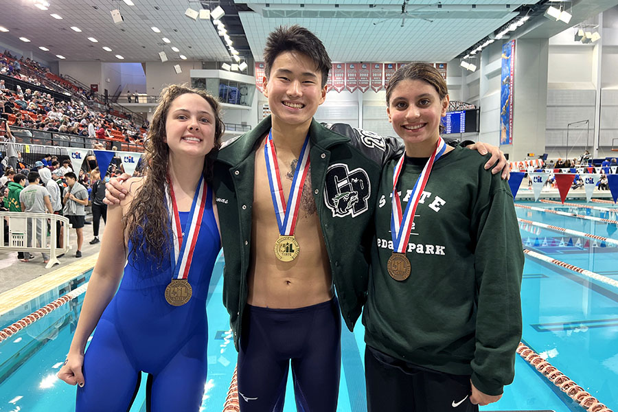 From left to right, junior Mickie Koltz, senior Thomas Wu and freshman Ella Mongenel pose with their medals after competing at State. All three of the students passed the preliminary competition, with Wu earning gold for the 100-meter breaststroke and Koltz and Mongenel earning bronze for the 200-meter individual medley and 100-meter freestyle respectively. “State this year was probably the best meet experience i’ve ever had,” Wu said. “While I had won last year, the guys and girls meet was separated and there were limited spectators, and so it was definitely not as exciting. This year, though, we had a very large team go from Cedar Park, and that honestly just made everything so much more fun.”