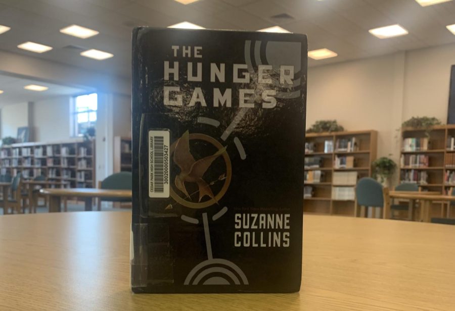 The+winner+of+the+Library+March+Madness+is+Hunger+Games+by+Suzanne+Collins.+Due+to+its+popularity%2C+the+book+was+able+to+stay+strong+throughout+the+multiple+rounds+of+the+competition%2C+according+to+Assistant+Librarian+Jennifer+Baskin%2C+who+applauded+the+book+for+its+years+of+success+and+relevance.+%E2%80%9CI+pretty+much+knew+that+was+going+to+be+the+winner+from+the+get%2C%E2%80%9D+Baskin+said.+%E2%80%9CI+was+kind+of+hoping+that+I+would+be+surprised+that+%5B%E2%80%98Hunger+Games%E2%80%99%5D+wasn%E2%80%99t+the+winner%2C+but+I+understand+why.+It%E2%80%99s+pretty+popular%2C+and+a+lot+of+people+read+that+book%2C+and+it+was+their+introduction+to+reading.+That%E2%80%99s+something+that+got+them+excited+about+reading%2C+so+it+makes+sense+that+they+would+still+be+excited+about+it.+I+think+that+book+has+held+up%2C+just+sort+of+like+%E2%80%98Harry+Potter%E2%80%99%2C+or+%E2%80%98The+Lightening+Thief%E2%80%99.+It+holds+up+even+when+I+read+it+as+an+adult%2C+but+I+was+still+surprised+that+it+was+still+going+so+strong.%E2%80%9D%0A