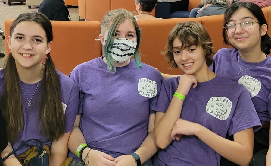 From left to right sit freshmen Gabrielle Merrill, Cara Allen, Erica Mihealsick and Mina Danesh, or the Madams of Mayhem. On March 25, the team competed at the State competition at University of Texas at Arlington and placed seventh in their Improvisational Challenge. “Destination Imagination is a creative group meant for people who like to do creative things,” Danesh said. “I fully intend on doing this throughout my entire high school career. I really like the aspect that there aren’t necessarily logical boundaries to [improv], and I think that’s pretty cool. I think we all really truly enjoy doing this with people we are super close to and doing activities we love to do and things that genuinely interest us.”