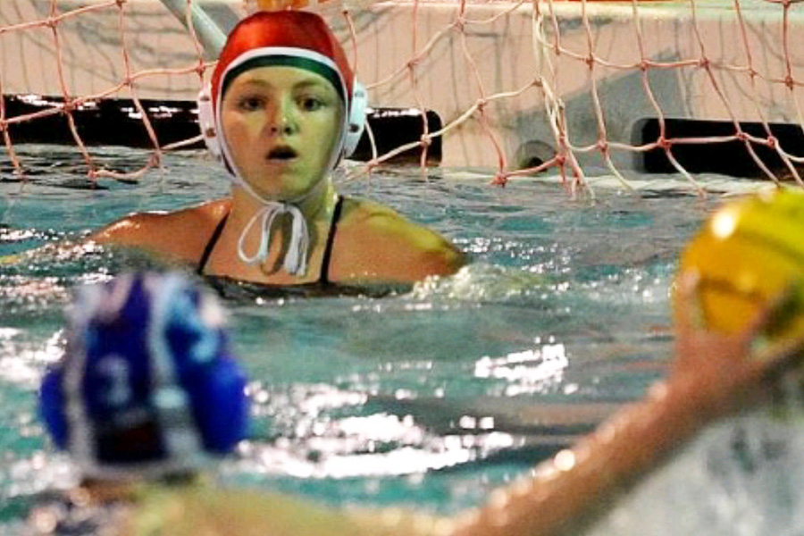Watching the eyes of the opposing player, sophomore Avery Nelson carefully  waits for her to decide the play. The girl’s water polo team were seated second in their district at the beginning of their season. “[Being a goalie] is very stressful,” Nelson said. “[It] feels like all the pressure is on you because youre the last line of defense, when the offensive opponents are coming at you, you always have to be on your guard. And Its very tough mentally because you always beat yourself up.”