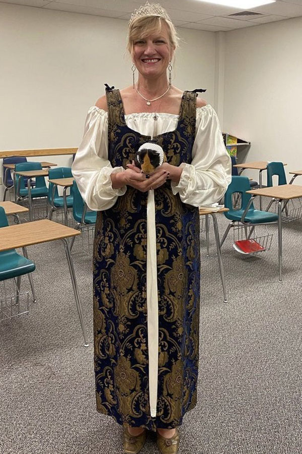 Holding her guinea pig, Vidrine dresses for Renaissance Day on Nov. 3, 2021. Instagram caption: But soft, what light through yonder window breaks? It is the east, and I am a #guinea pig. (Photo Courtesy of Kim Vidrine)