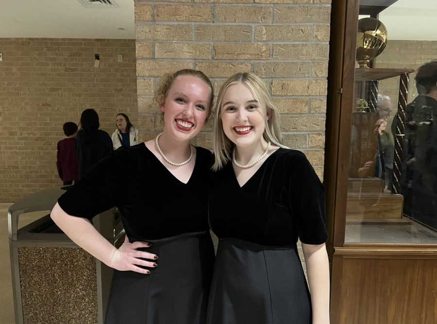 Posing in their choir dresses, seniors Ava Callaway and Charlotte Newman take a photo at the Region concert. The concert was held on Nov. 12, and 47 of the choir program’s students practiced for 10 hours in preparation for the concert. “I love the Region concert,” Newman said. “It’s the best voices in the region all together, so basically every moment is so musical. I think my favorite part was definitely our ending song “Trinity Te Deum.” It’s just a gorgeous, happy song that is full of so many powerful chords.” (Photo Courtesy of Charlotte Newman)