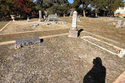 Analyzing a gravestone, a student takes a picture for their elegy. The project was due Friday, November 11, and involved students visiting a graveyard, taking a picture of a gravestone and writing a poem about it. “My favorite part was really trying to put myself into the perspective of my poem, which was extremely eye opening,” alumni Hailey Bowerman said. “It really made me appreciate life and the people I love around me and it really opened my eyes to how precious life and love is, especially when we are young.” 
