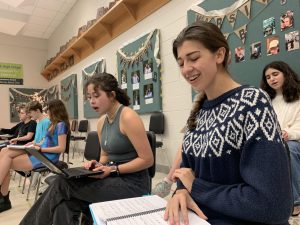With a smile on her face, junior Madi Cooper practices her music for theater’s musical “Big Fish.” The show will be Jan. 26 -28 at 7 p.m. in the PAC. “I love all the people in the theater department,” Cooper said. “I have never met a more determined and hard working group of people than those in theater, so many people are go-getters and achievers and it really helps our productions in the long term.”