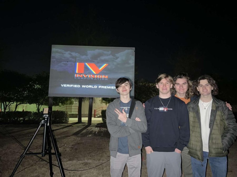 From left to right, junior Cason Johnson and seniors Ryan Green, Caleb Taylor and Anthony Luparello stand in front of the screen where their movie was projected during the premiere. The Premiere was held at Milburn Park on Jan. 14 and can also be viewed on YouTube. “It was very surreal to present the movie in front of a lot of people that I knew,” Green said. “It was a surreal experience because up to that point, it was just us looking at this movie. But we got to share it with a bunch of people and the surreal part was people reacting to the movie. That was really cool to watch and see people laugh at the jokes that we wrote. It was very satisfying.”
