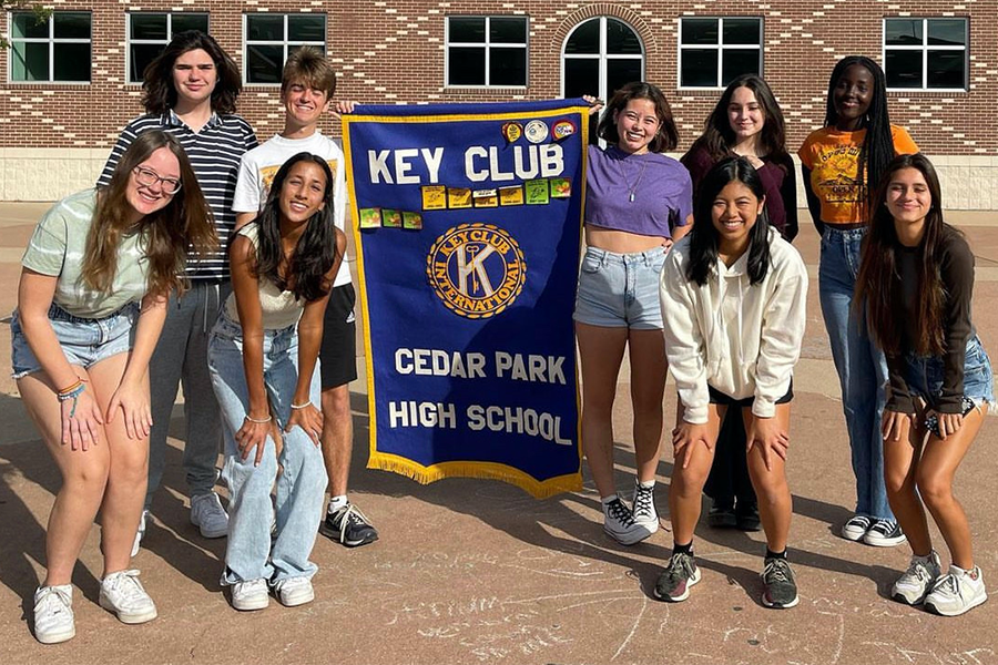 Posing for a picture, Key Club Officers hover around the banner. Key Club meets every first and third Wednesday of the month at 7:45 a.m. in Durden’s room at 5004. “The Key Club Officer team is great this year,” secretary Samantha Jameson said. “We have a great time together and have made many good memories while volunteering.”
(Photo Courtesy of @cedarpark.keyclub on Instagram)
