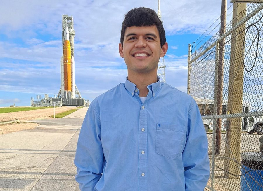 Alumnus+Jorge+Chong+poses+in+front+of+the+Orion+spacecraft+used+in+NASAs+Artemis+I+mission%2C+the+first+phase+in+the+Artemis+programs+plan+to+land+the+first+astronauts+on+the+moon+in+over+50+years.+Chong+is+one+of+the+engineers+responsible+for+the+next+groundbreaking+lunar+mission.+%E2%80%9CI+began+becoming+very+interested+in+aerospace+in+high+school+and+started+becoming+passionate+about+it+then%2C%E2%80%9D+Chong+said.+%E2%80%9CI+honestly+thought+I+would+work+in+the+aeronautics+sector%2C+working+with+aircraft+and+airplanes.+I+didnt+anticipate+working+with+spacecraft+or+working+in+the+space+world+at+all.+So+that+was+kind+of+unexpected%2C+but+thats+where+the+doors+ended+up+opening%2C+and+it+became+something+that+I+really+love.%E2%80%9D+%28Photo+Courtesy+of+Jorge+Chong%29%0A