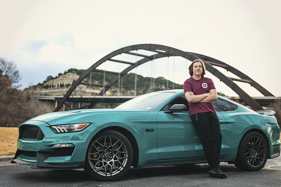 Leaning against his project car, senior Matthew Chater takes his senior photos by the 360 Bridge. Chater has been participating in the Automotive Technology class since his sophomore year. “I didn’t know what my future was going to look like before I found automotive,” Chater said. “Ever since I put the class on my schedule, it has opened so many doors for me, and given me so many great opportunities to be seen by brands and dealerships so I can continue to do what I am passionate about for the rest of my life.” (Photo Courtesy of Matthew Chater)
