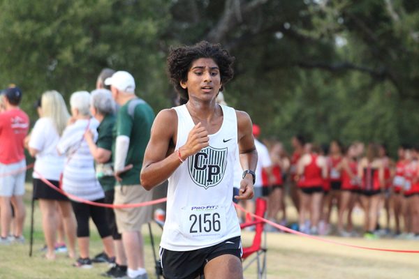 Starting his second lap of the race, senior Sanil Desai continues through the course at the Vista Ridge cross country invitational on Aug. 25. This was the second meet of the season and Desai finished in 19th place. “I was thinking about the team placements,” Desai said. “A lot of the schools at the Vista meet will be at districts so I was trying to pass as many people as I could, I’m mostly worried about Leander because they have an all around strong team.” 