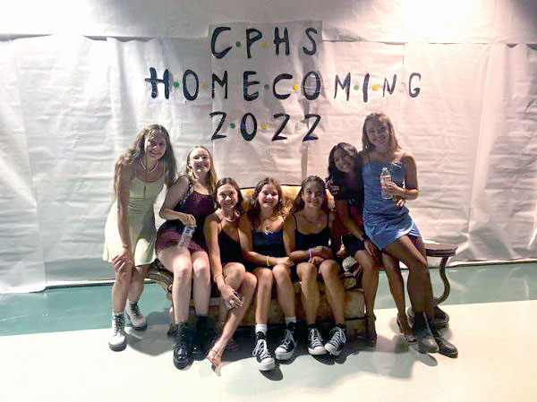 Posing for a picture at last year’s homecoming, sophomore Emilya Garza sits with her friends on a  couch set up for photo-taking. At the 2022 dance, there were arcade machines and students were able to purchase disposable cameras. “Honestly my favorite memory was taking pictures with the couch,” Garza said. “They set up a couch at homecoming and [the backdrop behind] it said ‘2022 Homecoming.’ Everybody was taking pictures there and you could get 20 people on that couch it felt like. That was my favorite part because you could take pictures and laugh and you’ll have them forever.”
Photo courtesy of Emilya Garza
