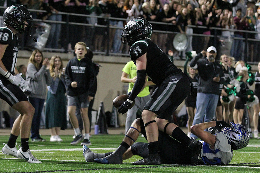 After scoring the game winning touchdown during the last regular season game on Nov. 3, senior tight end Luca Wilson celebrates with his senior teammate, wide receiver Carter Woehl. The team will face Canyon High School tonight at 7:00 p.m. “I mean I’d say we’re pretty excited,” Wilson said. “For the seniors, we don’t want to go home yet, it’s our last season together and we just want to try and make a long run. We just want to win and get a gold ball, and keep getting more gold balls.” 